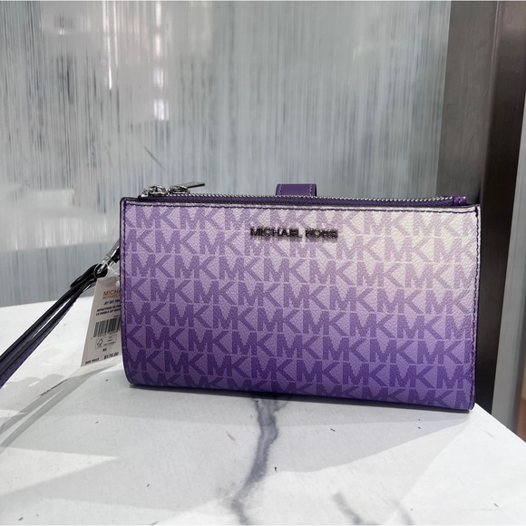 Michael Kors Handbags - Michael Kors Jet Set Travel Double Zip Wristlet